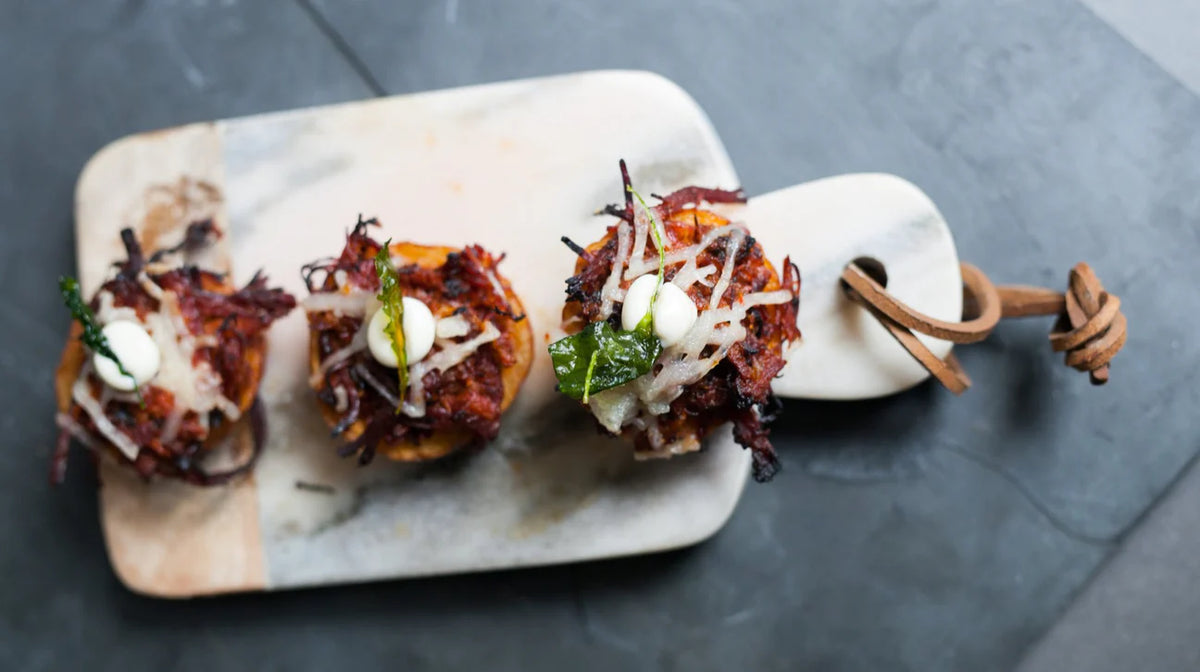 Three delicious or d'oeuvres plated from Ely's Fine Foods Kosher food delivery services 