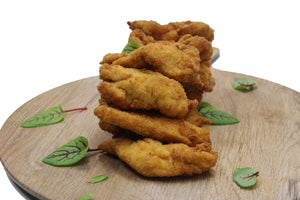 a pile of breaded kosher chicken fingers made by Ely's Fine Foods in Toronto